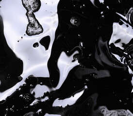 abstract black background of liquid asphalt bitumen