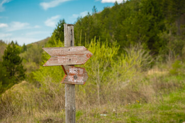 Mountain view , road and a sign