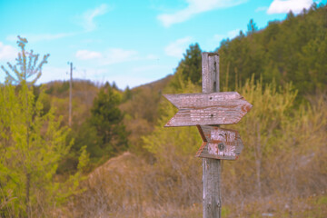 Mountain view , road and a sign