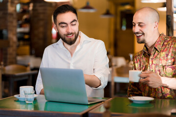 Business people on a meeting at a coffee shop.