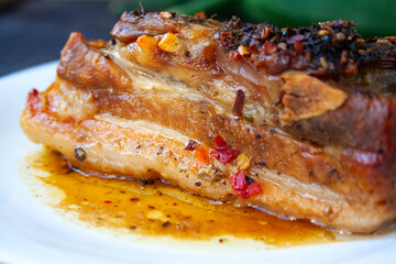 Spicy fried brisket with interlayers of pork lard, baked with herbs and spices