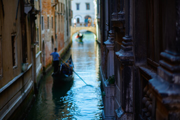 Fototapeta na wymiar Closeup on with gondola and street in Venice, Italy
