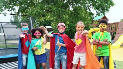 Children studying and having fun at school. Multiethnic group of kids learning at the primary school