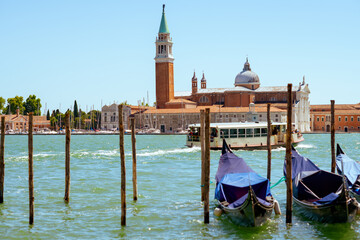 landscape with gondola and vaporetto