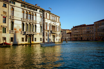 Fototapeta premium landscape with motorboat and grand canal in Venice, Italy