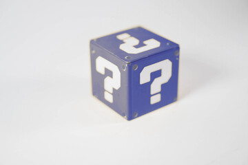 blue metal toy blocks with a question mark