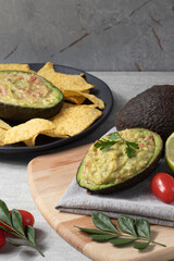 Guacamole served with nachos, Mexican food.