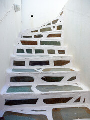 Colorful stone white staircases in oia santorini island greece