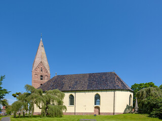 Fototapeta na wymiar >>>HISTORICAL<<< Reformed church with Juffertoren in the Groningen Schildwolde,
