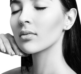 Fototapeta premium Young brunette woman with perfect makeup and skin.