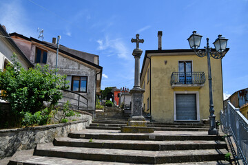 Vallata, Italy, July 3, 2021. A street between the old houses of a medieval village in Campania region.