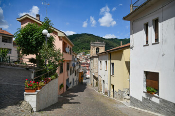 Fototapeta na wymiar A street between the old houses of Carife, a medieval village in Campania region.