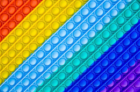 Bright, popular texture. Colorful fashion anti-stress touch toys fidget push pop it. Autism.