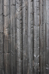 Wood wooden brown, grey with plank texture wall background. Wooden surface of the vertical boards. Background for design and presentations.