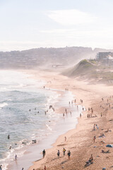 Crowded Beach at Sunset
