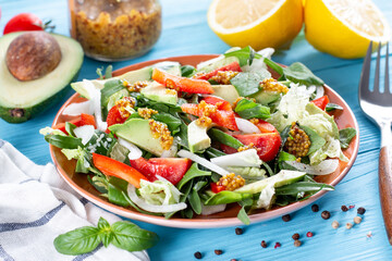 A healthy salad of avocado and vegetables. Healthy eating. Vitamin salad