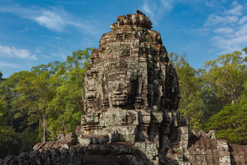Fototapeta premium Giant faces on Prasat Bayon temple, Angkor Thom, Angkor, Siem Reap province, Cambodia, Asia