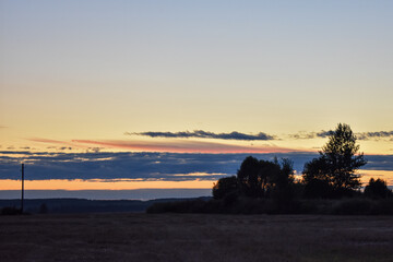 Obraz premium colorful summer sunset in the field