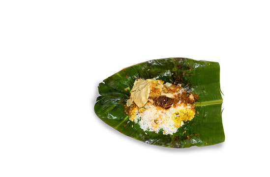 Rice And dish Wrapped In Banana Leaves