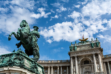 Low angle view of the Statue of Prince Eugene on the Herosquare in Vienna, Austria in front of the Hofburg Palace