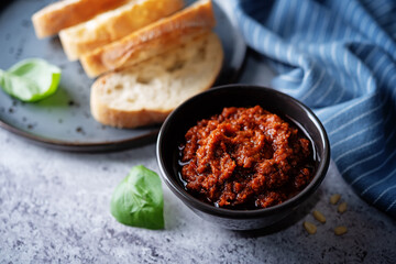 Dried tomatoes nuts pesto in a bowl