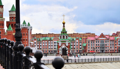 View of Patriarch's Square and the Embankment of Bruges from the Sunday Bridge. Russia Yoshkar-Ola 01.05.2021. High quality photo
