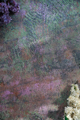 Texture background with bright flowers of lilac for the cover of the notebook diary or congratulations on the woman's holiday