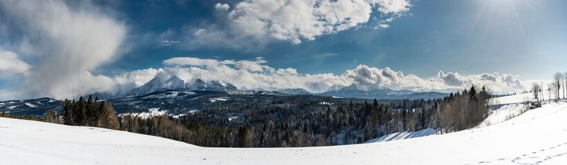 Fototapeta na wymiar Beautiful winter landscape with a view of the Tatra Mountains