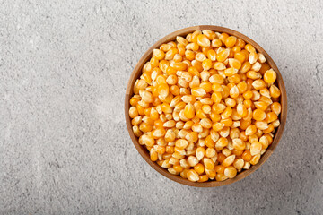 Dried corn. Raw corn for popcorn on the table.