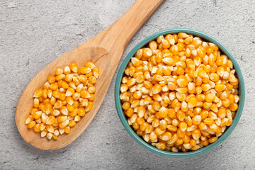 Dried corn. Raw corn for popcorn on the table.