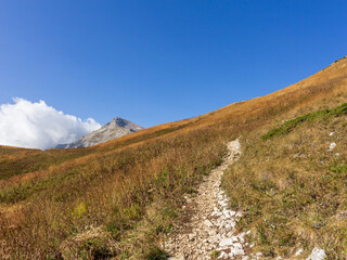 Panoramic views of the mountains from hiking trails in the mountainous area on a warm, sunny autumn day, walking and communicating with nature.