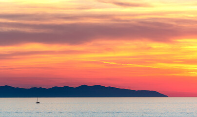 View of Capraia from Nisportino beach at sunset, Elba Island.