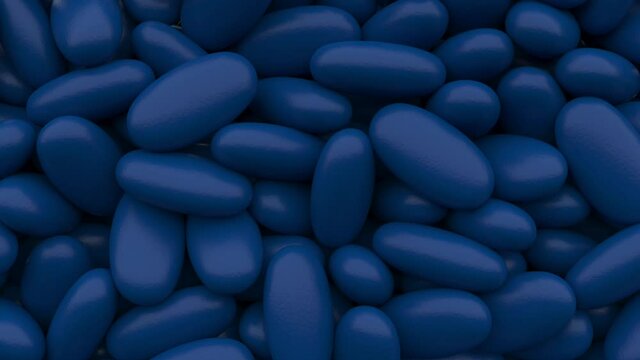 Blue falling 3D pills pouring, filling a screen isolated on a black background with luma matte. Candy, dragee