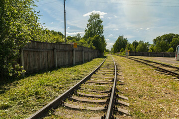 Old abandoned railroad in a sunny summer day