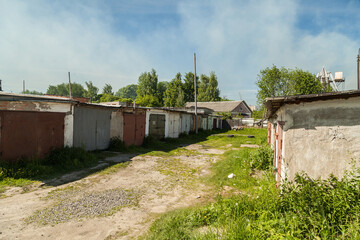 Fototapeta na wymiar Old soviet garages in sunny day