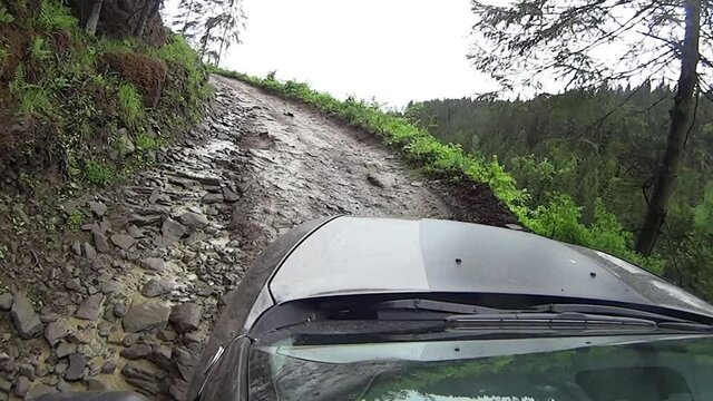 extreme road in the mountains after the rain