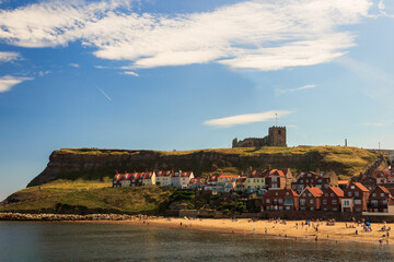 Naklejka premium People enjoying the beach of Whitby Bay