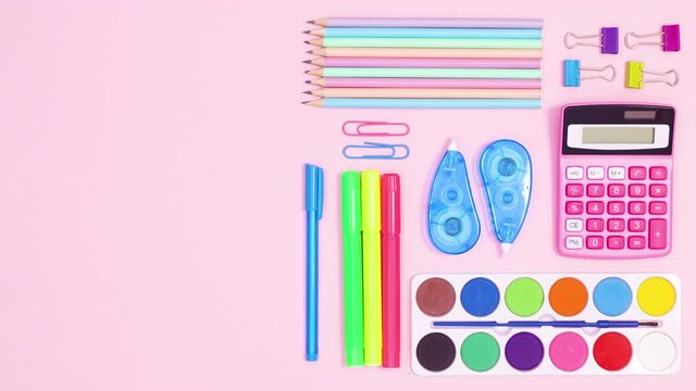 Pastel school accessories appear and make creative layout on pastel pink theme. Stop motion