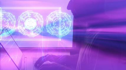 Silhouette of a man in front of a computer on the background of a screen with a moving of HUD. Double exposure