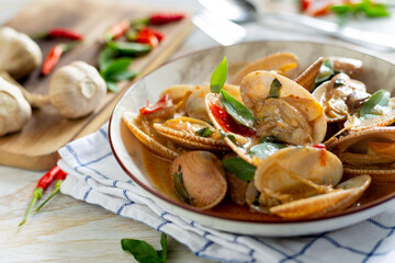 Stir-fried clams with chilli paste on the table