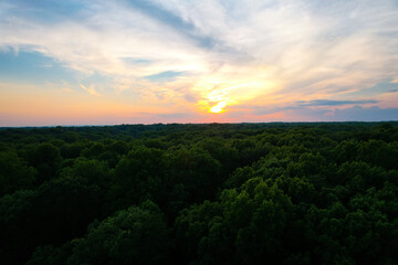 sunset behind the clouds