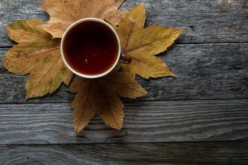 Cup of tea on an old wooden table