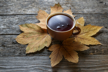 Cup of tea on an old wooden table