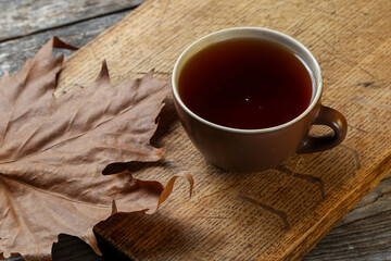 Cup of tea on an old wooden table