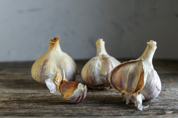 Garlic on an old wooden table