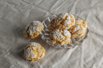Homemade cookies on a table with a linen tablecloth