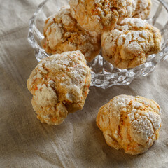 Homemade cookies on a table with a linen tablecloth