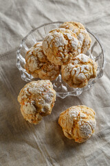 Homemade cookies on a table with a linen tablecloth