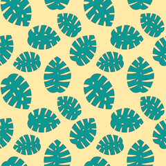Monstera leaves pattern on yellow background