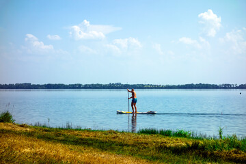 Summer sports activity on a paddleboard